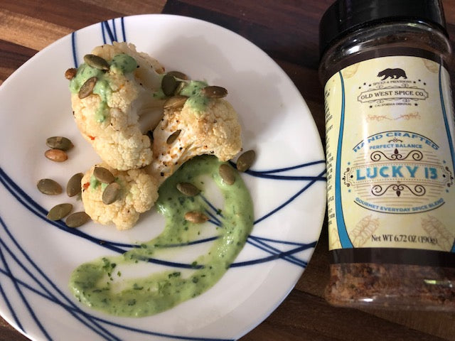 Lucky 13 Roasted Cauliflower with Avocado Cilantro Dressing and Pepitas